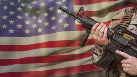 animation of hands of soldier holding assault rifle over waving american flag