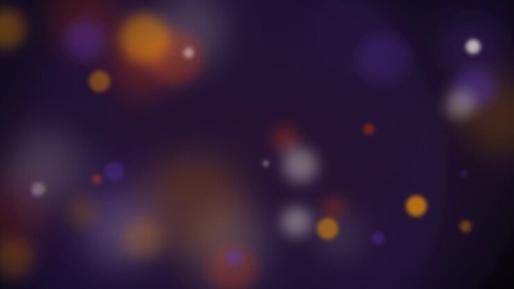Abstract Background with Floating Colorful Bokeh Light Particles