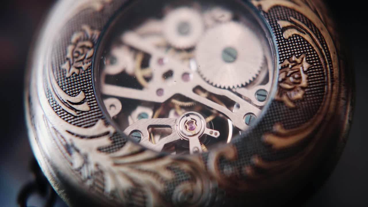 Close-up of Intricate Vintage Pocket Watch Mechanism with Moving Gears