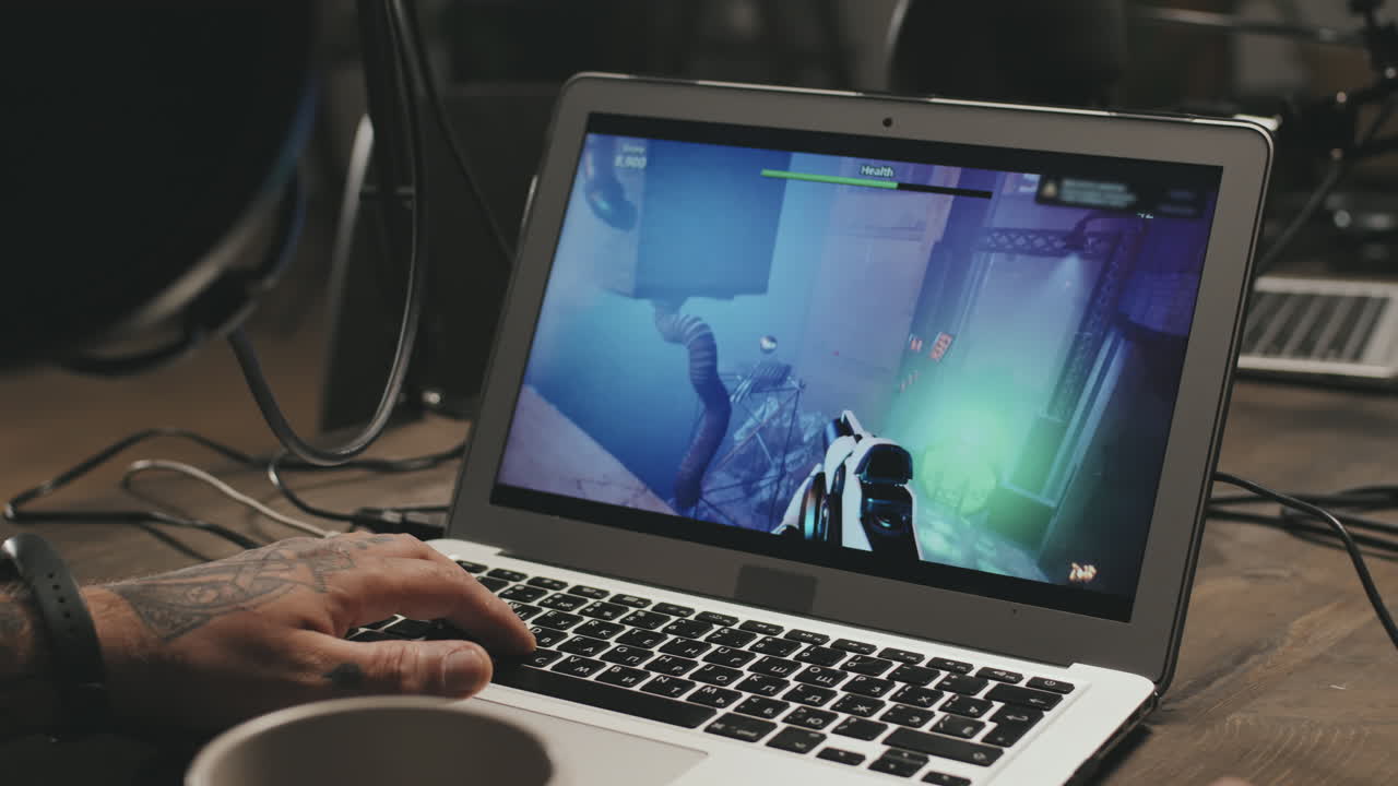 Hands of Man Playing Video Game