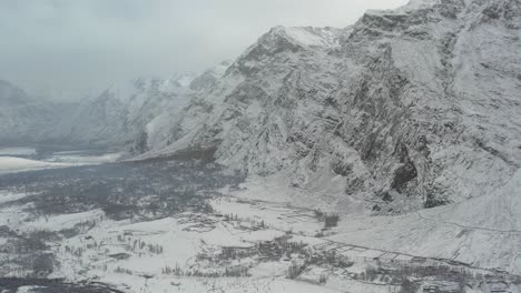 Drone-shot-of-snow-covered-high-mountains-near-Skardu-City