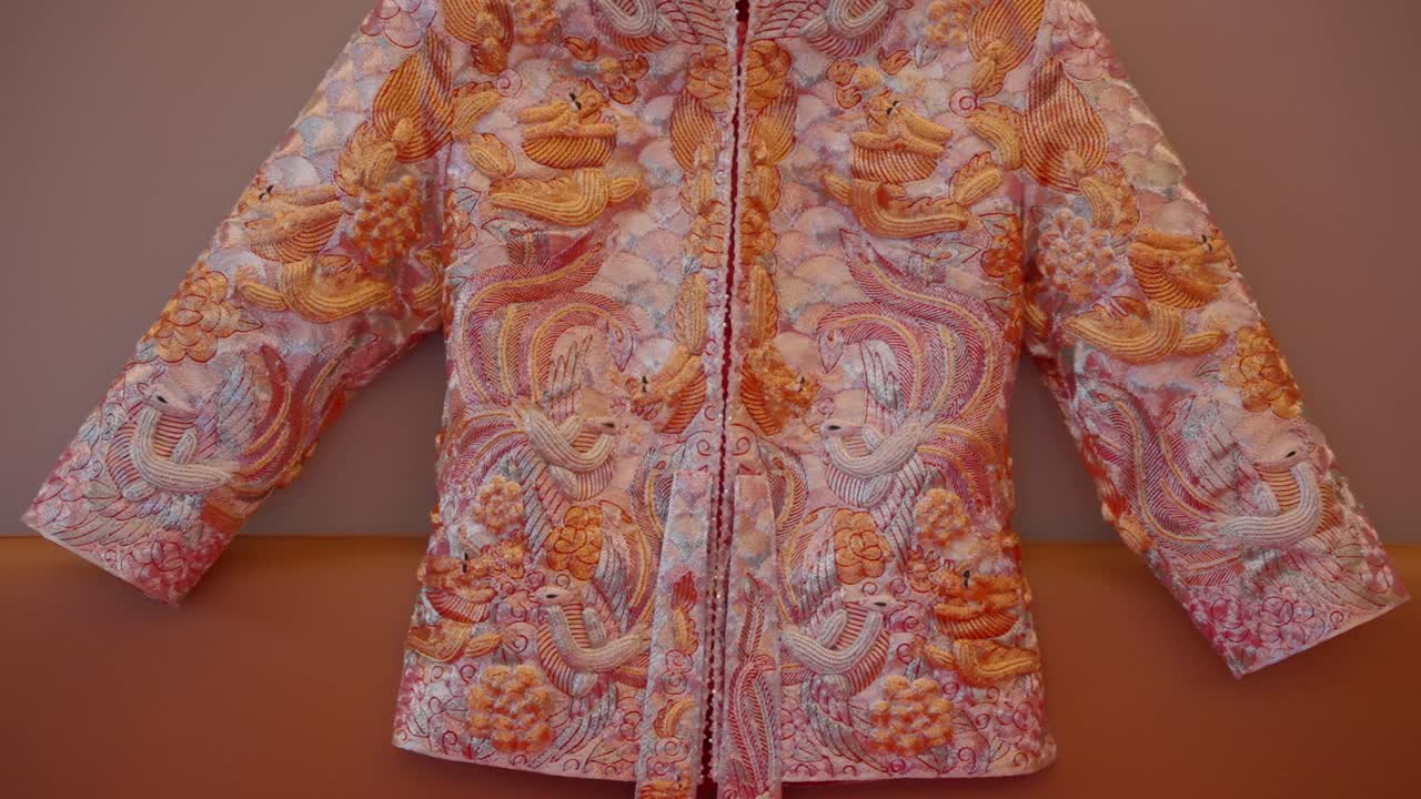 Chinese wedding attire and double happiness symbol decoration