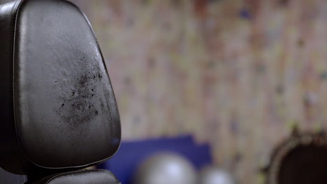 cleaning a gym equipment seat