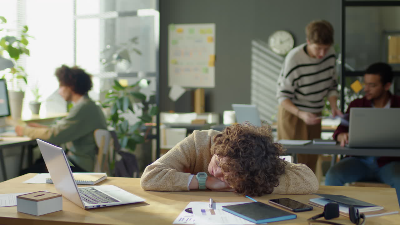 Timelapse of Businesswoman Sleeping at Office Desk