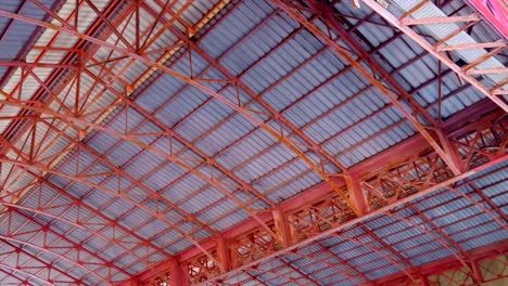 warehouses, with roofs from metallic, arched-type beams on the seaport territory