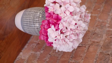 pink and white hydrangea bouquet in a gray vase