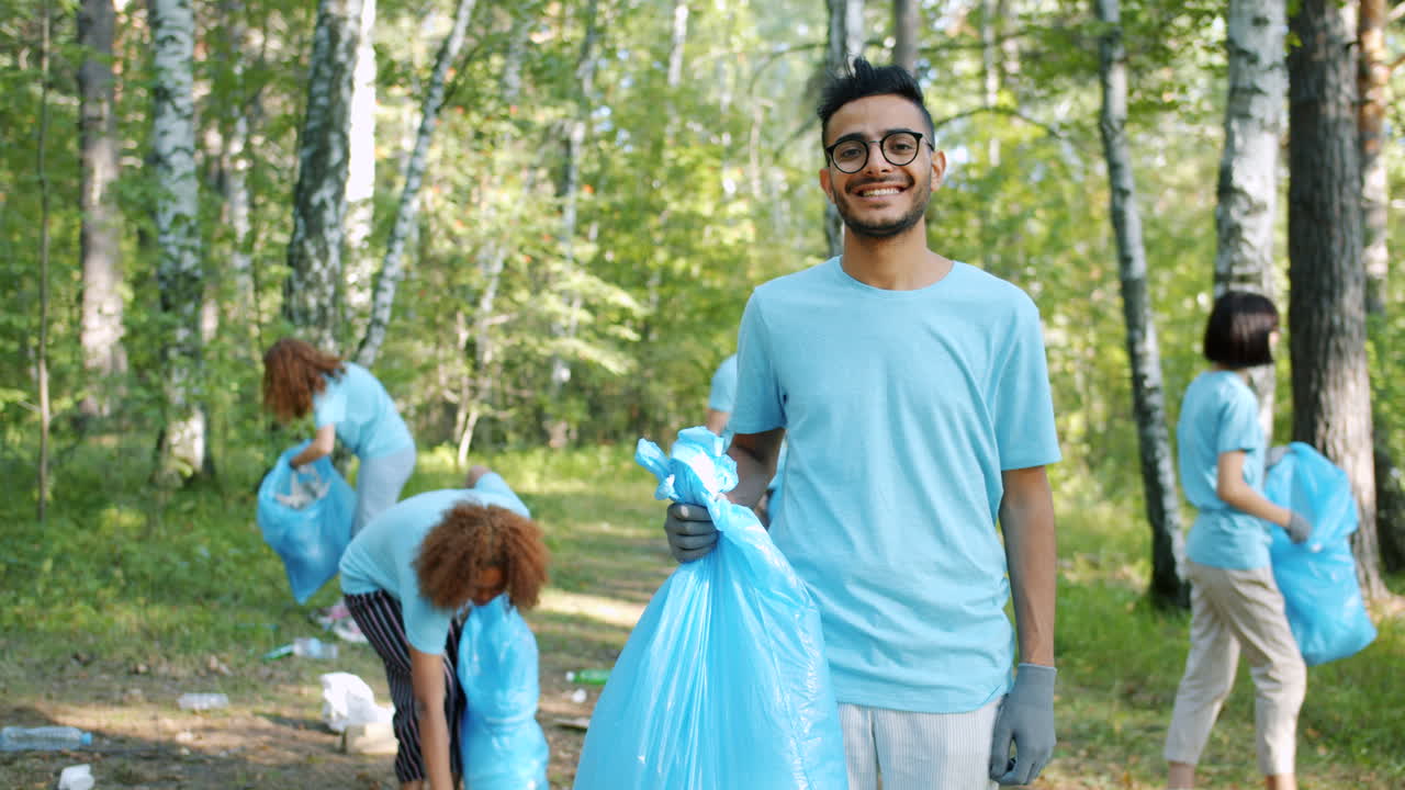 Community Volunteers Cleaning Up a Forest