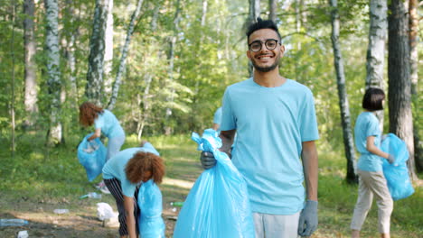 community volunteers cleaning up a forest