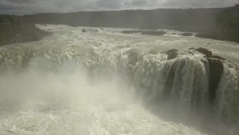 powerful waterfall in iceland