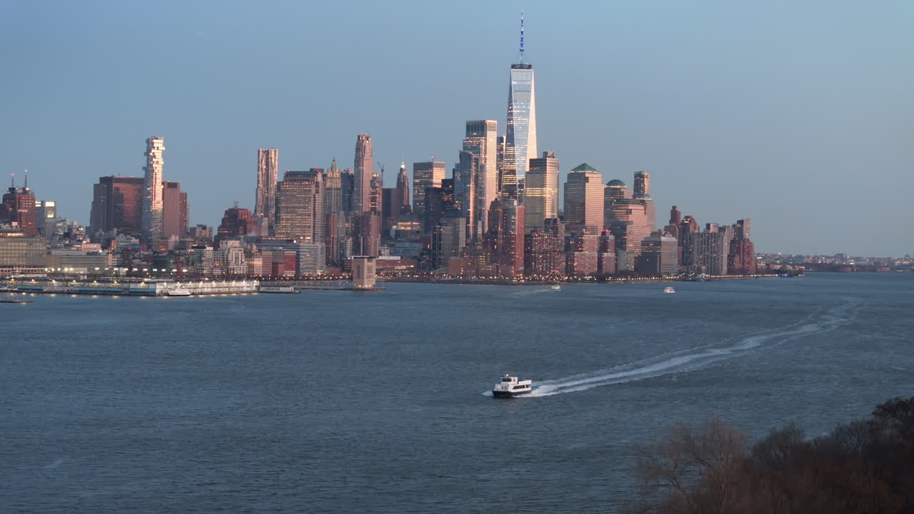 Aerial view of a ferry on The Hudson River at night