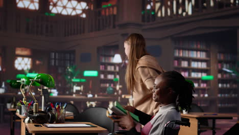 vertical video girl pushing her colleague with physical impairment through the library