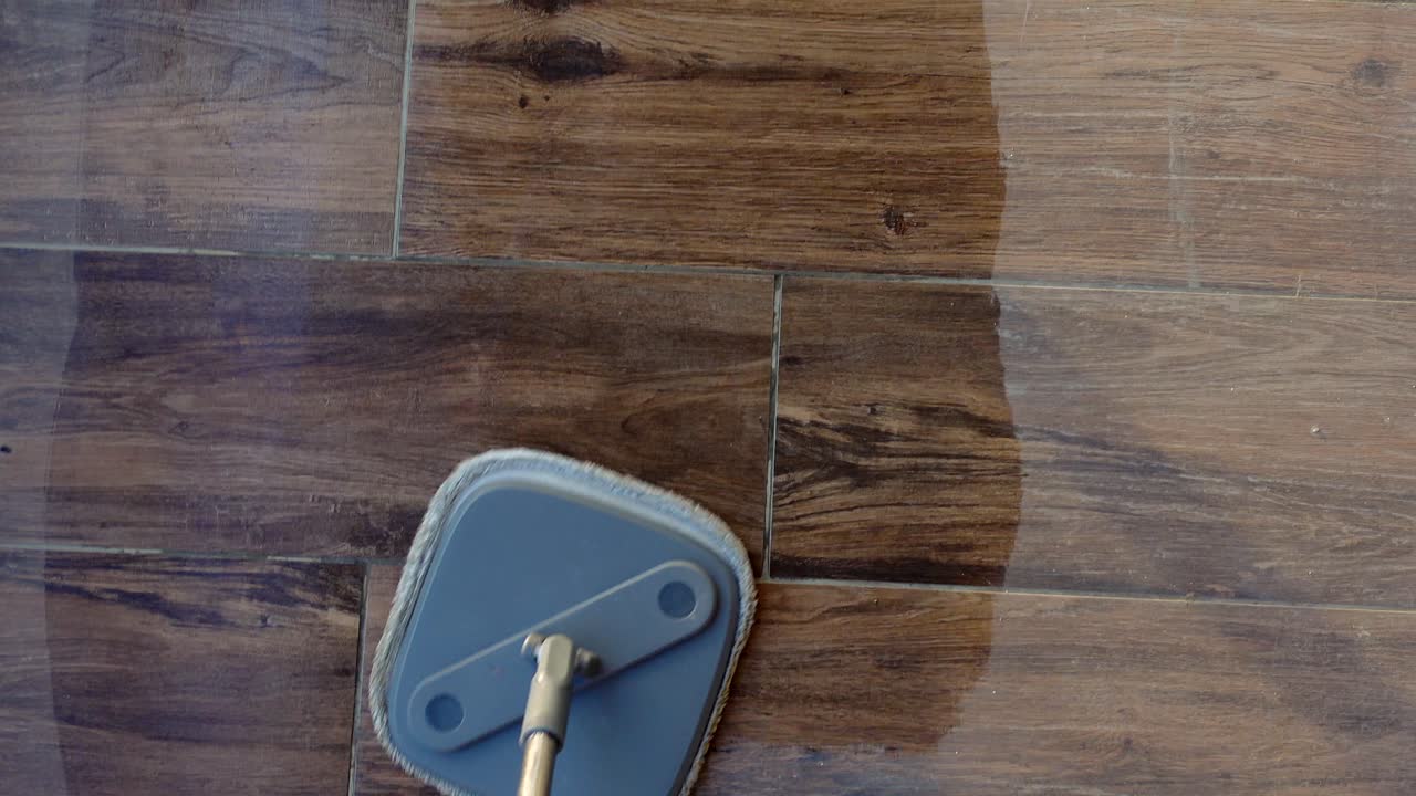 Cleaning a wood-look tile floor with a mop