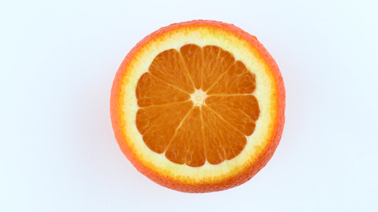 frutas de naranja cortadas girando. aisladas en fondo blanco. vista desde arriba o por encima. macro de cerca.