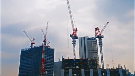 time lapse architecture crane under construction of building