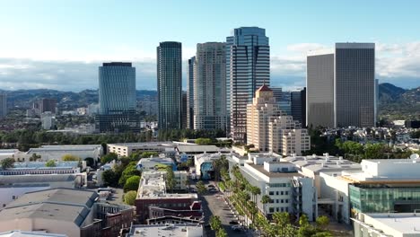 drone shot rising over century city in los angeles with fox studios