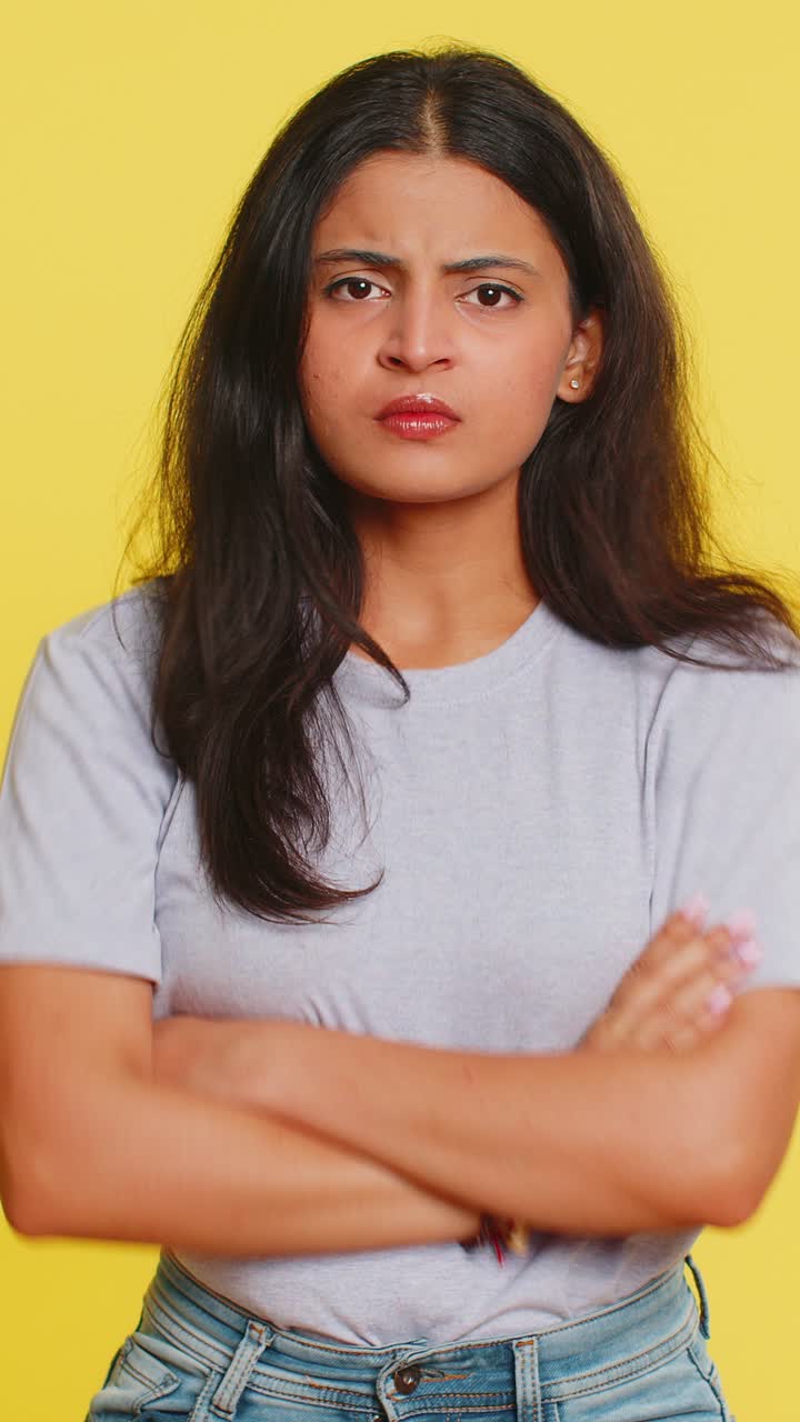 Irritated displeased aggressive unhappy indian woman gesturing hand blaming scolding failure problem
