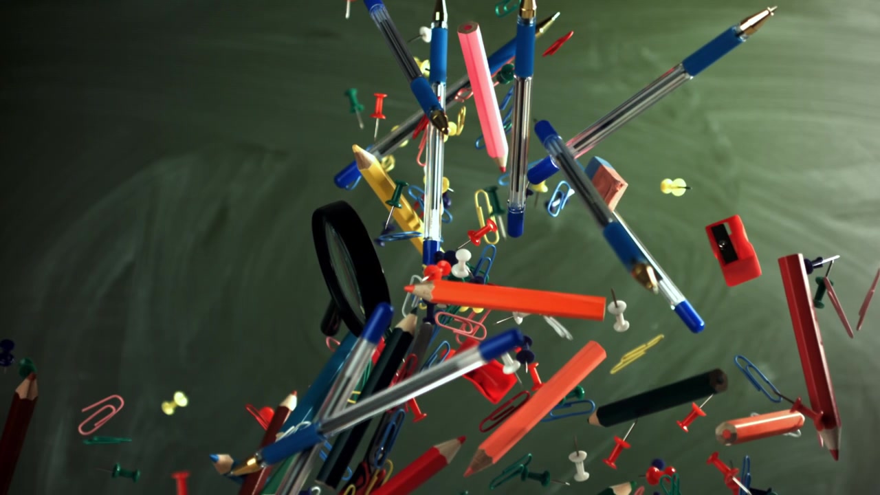 Colorful School and Office Supplies Floating Against a Chalkboard