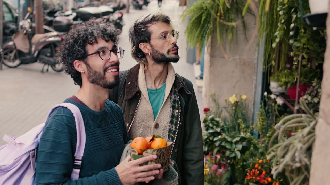 Gay Couple Walks Past Flower Shop