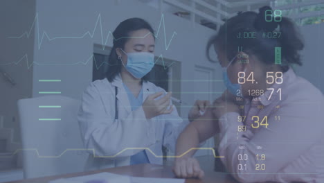 animation of data processing over asian doctor and patient wearing face masks