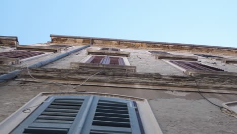 old windows, on an old building