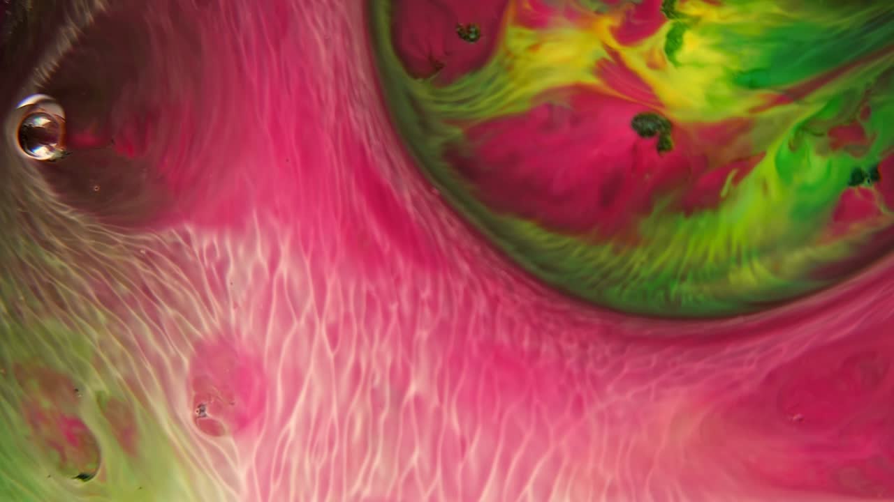 mezcla de colores de pinturas, fondo abstracto de formas morphing. increíbles imágenes en movimiento creadas por tintes giratorios.