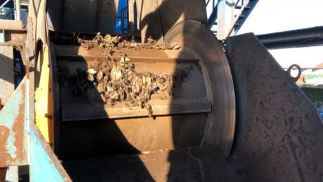 A spinning magnet from a shredder which sorts recycled metal