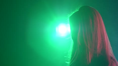 dj silhouette in neon lights