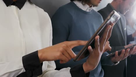 Group-of-executives-using-digital-tablet-4k