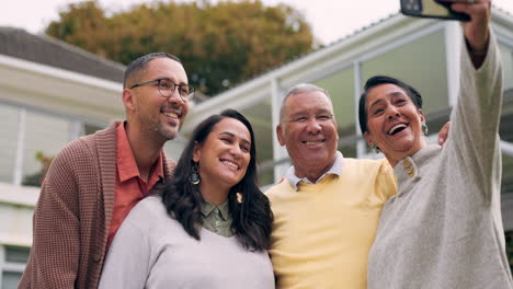 family, senior parents and selfie in backyard