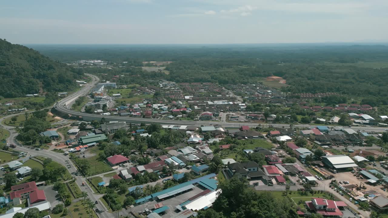 Aerial Drone View, Serian District Town ,Summer With Beautiful Green Trees,New Building And Water Park Lake, Water From The Mountain Sarawak,Borneo.