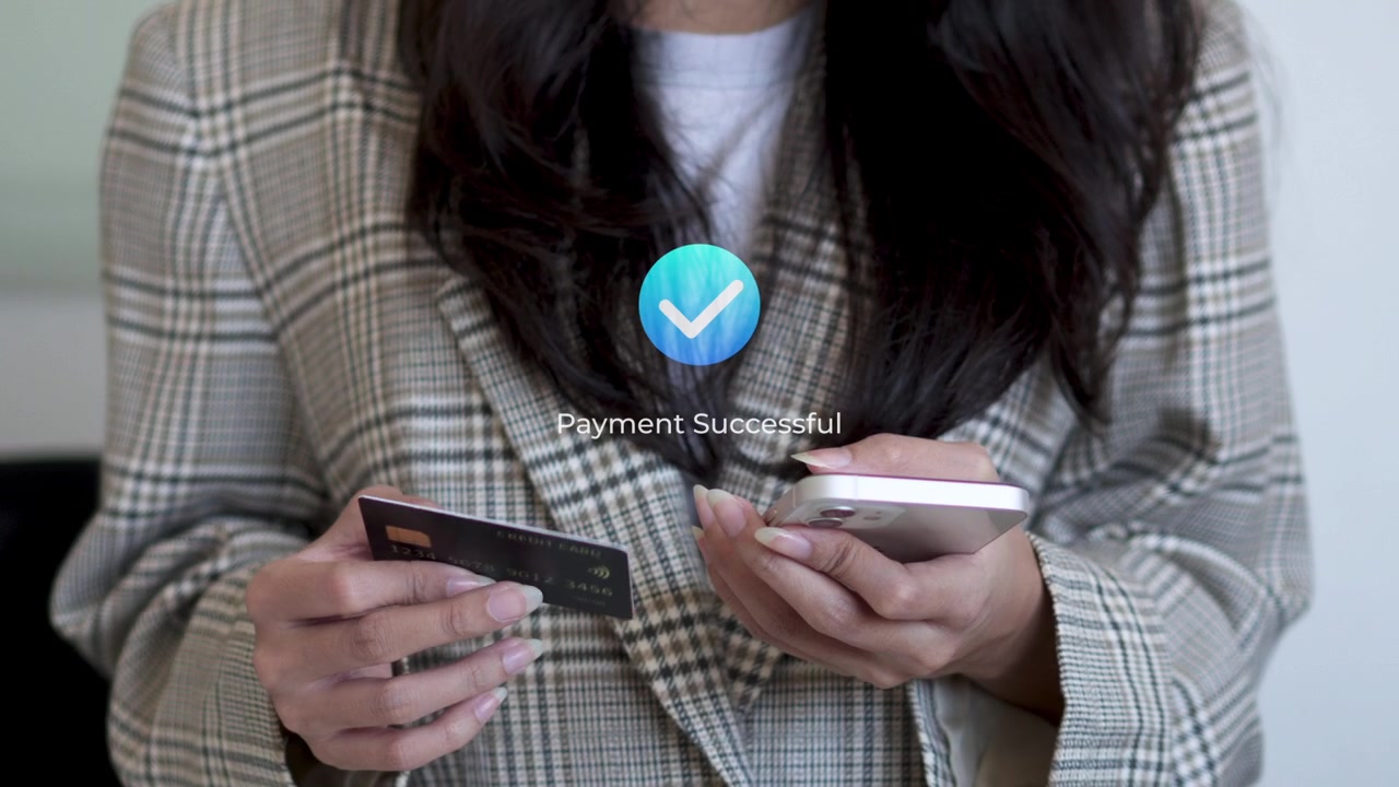 Businesswoman using smart phone and credit card for Direct peer-to-peer bank payment transfer