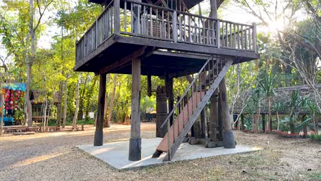 wooden tower amidst lush green forest scenery