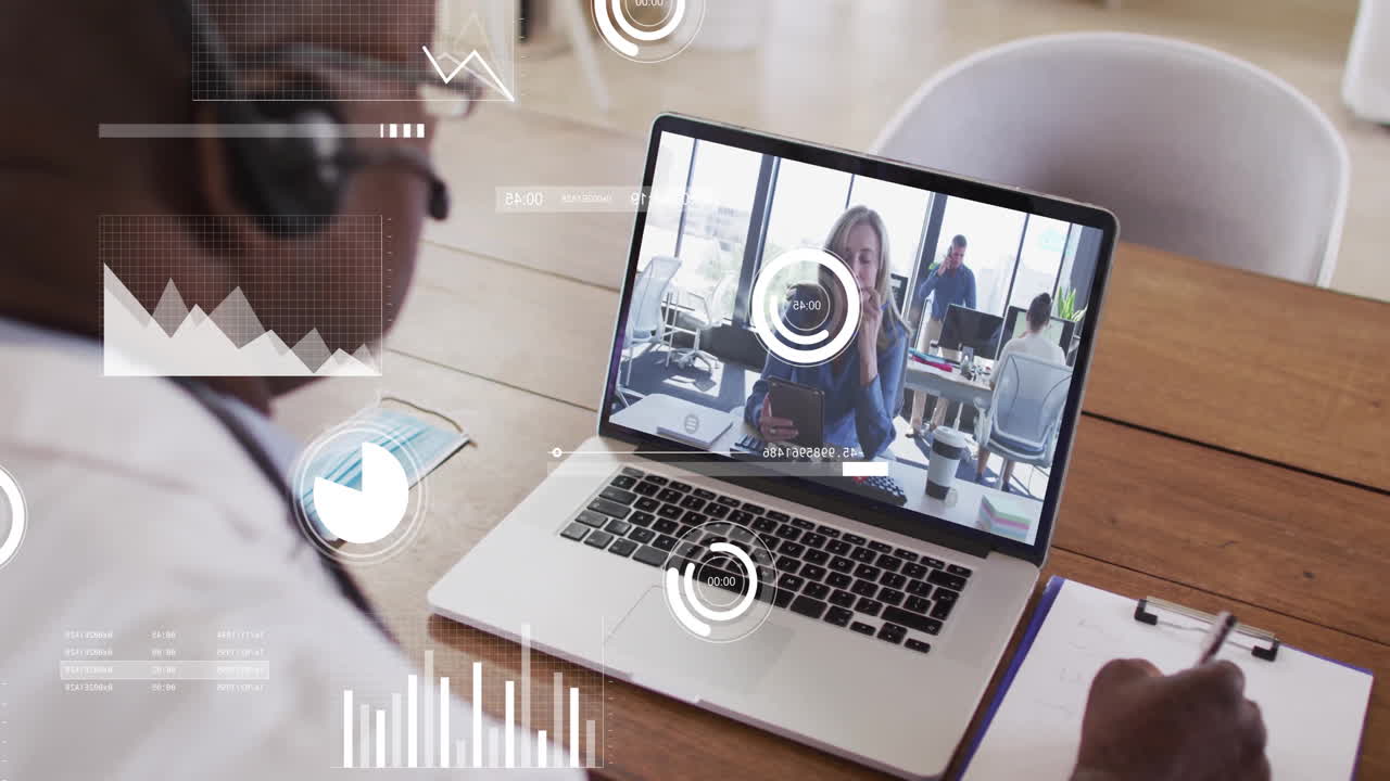In office, business professional on video call with animation data analytics on laptop
