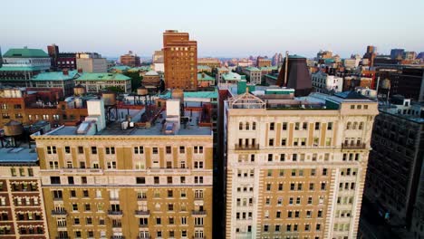 smooth shot of nyc apartment buildings and rooftops on riverside drive