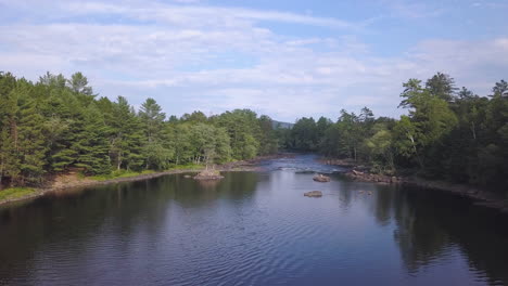 aerial drone shot flying up to reveal the beautiful landscape of algonquin park, ontario, canada