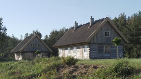 old cozy wooden houses in nature tranquil peaceful landscape