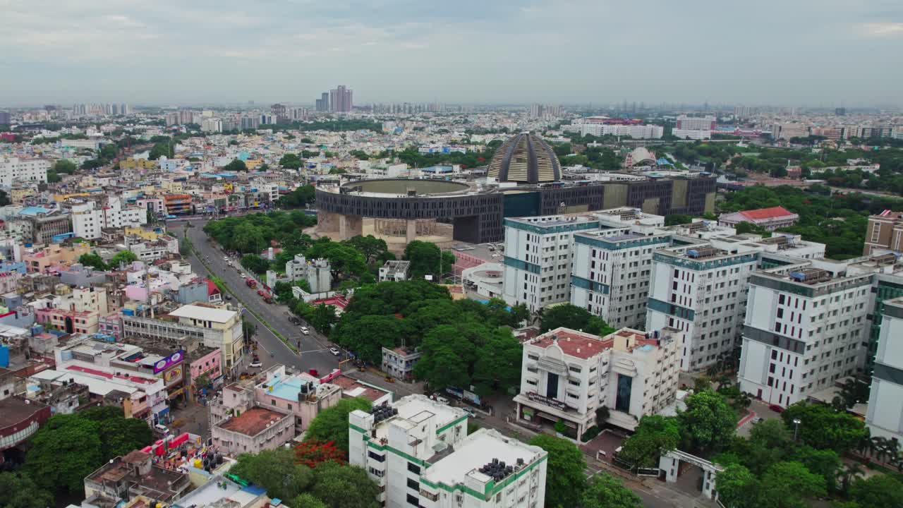 aerial view of wallahjah road with Government college and Multi Super Speciality Hospital at Police Quarters, Triplicane, chennai, tamil nadu. day time, push in, drone shot, 4k.