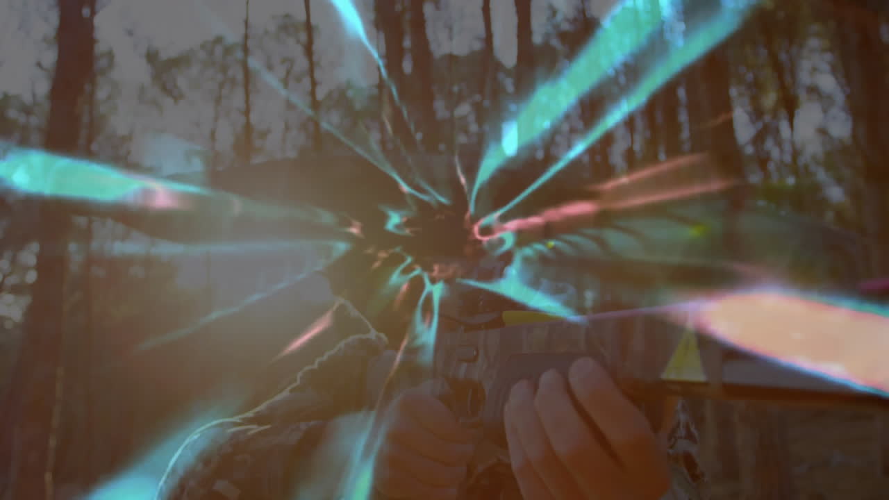 Hunter aiming rifle in forest, displaying animated range data and target icons for tech demo