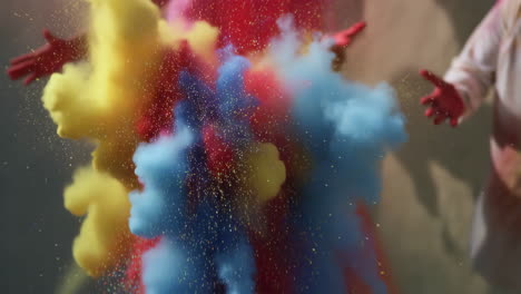 vibrant colorful powder explosion with person