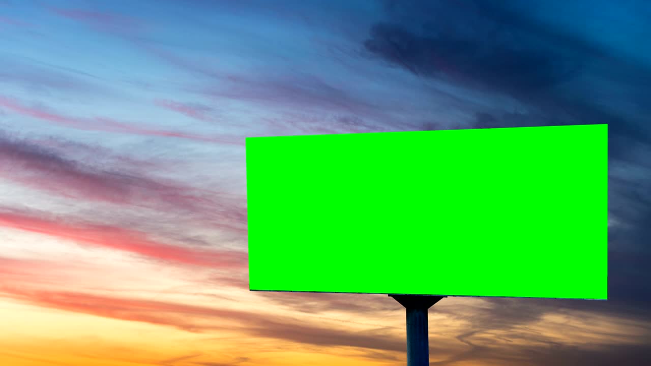 Advertising billboard green screen at sunset. Time lapse sunset.