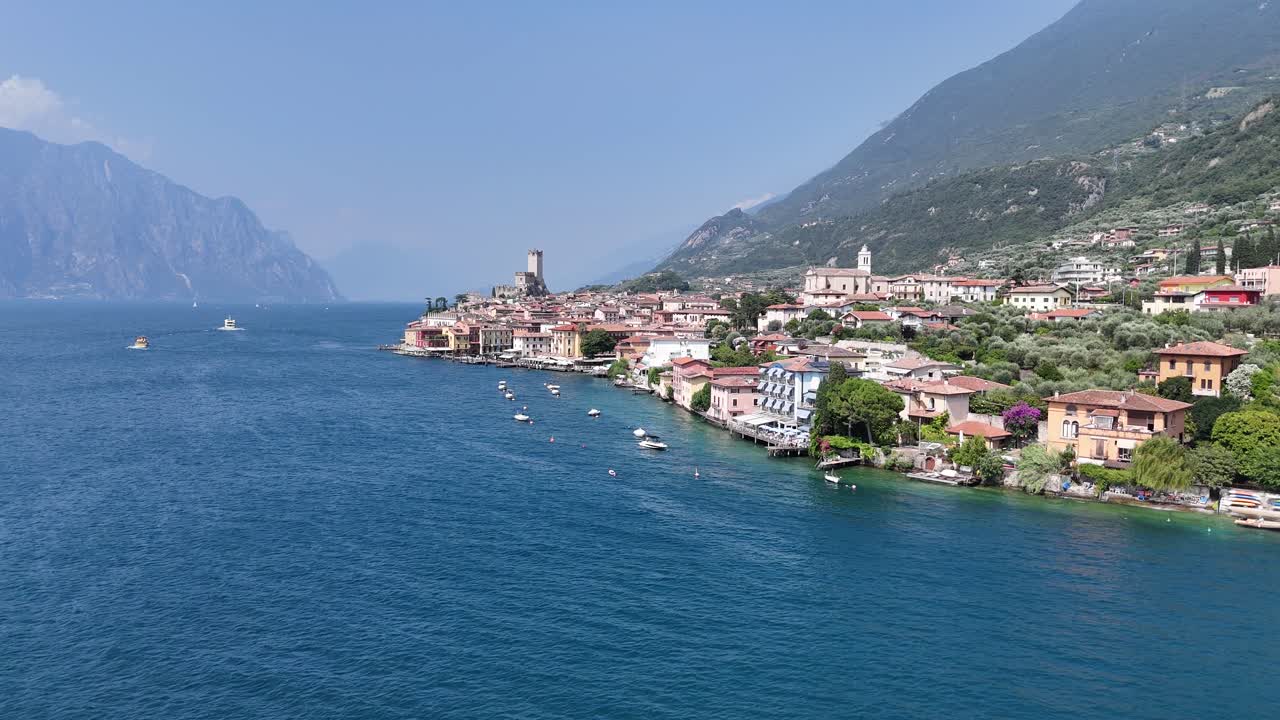 Malcesine Lake Garda Italy Panning drone aerial blue sky
