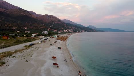 sunset on the beach, mountain view in albania