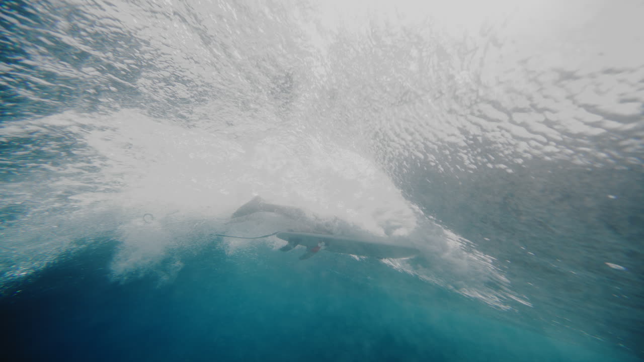 Surfer Underwater