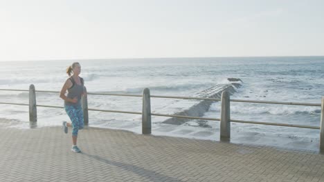 senior woman running on a promenade