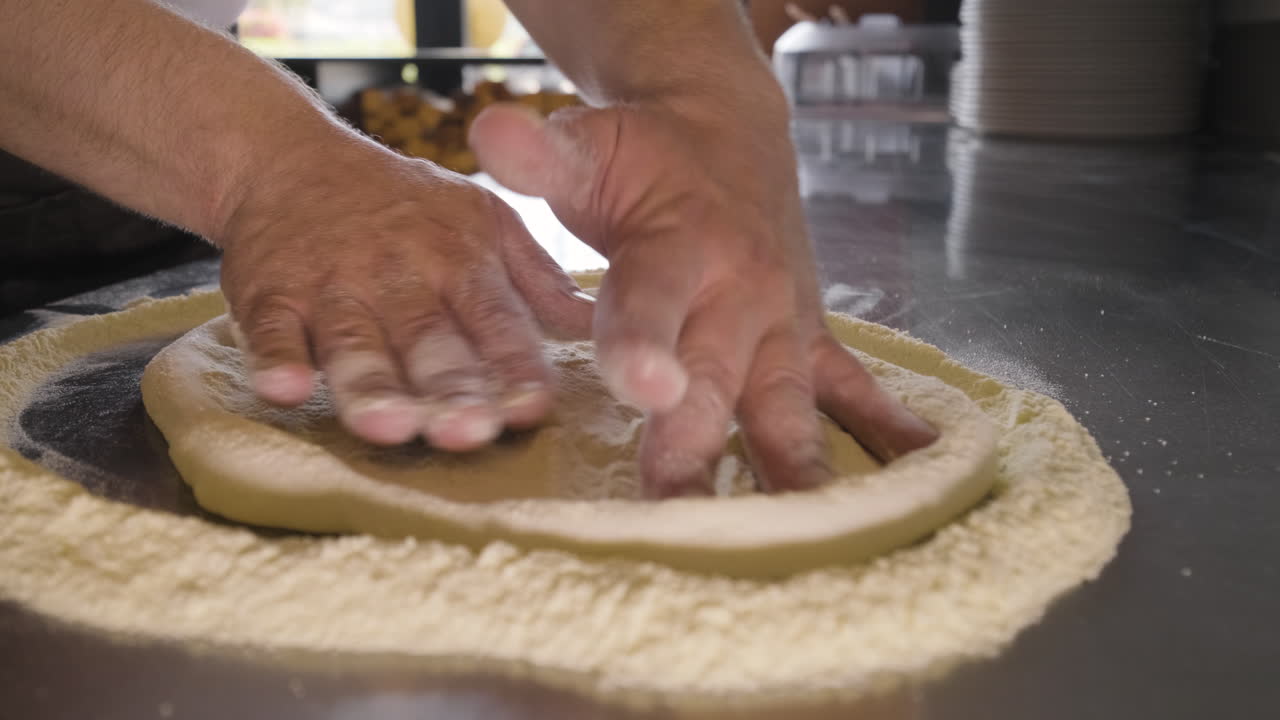 Free Stock Video Close Up View Of A Chef Hands Kneading Pizza Dough