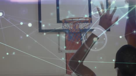Animation-of-network-of-connections-over-basketball-match-in-gym