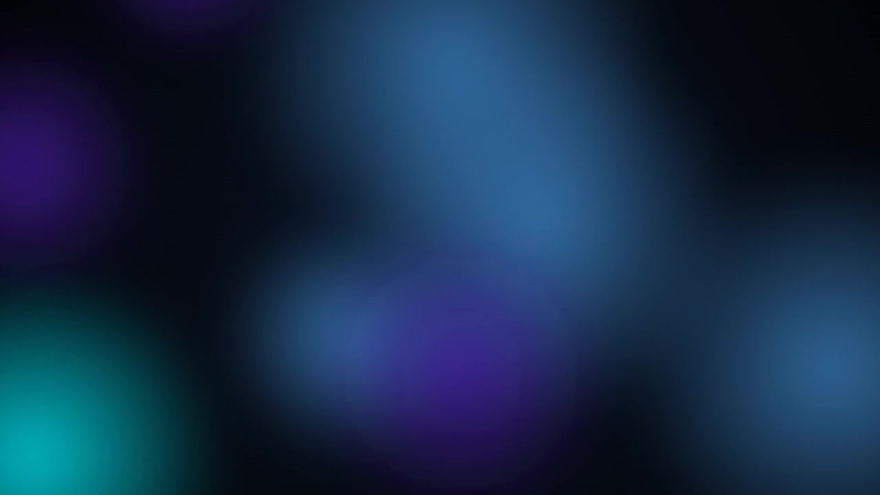 Abstract Background with Floating Blue and Purple Bokeh Lights