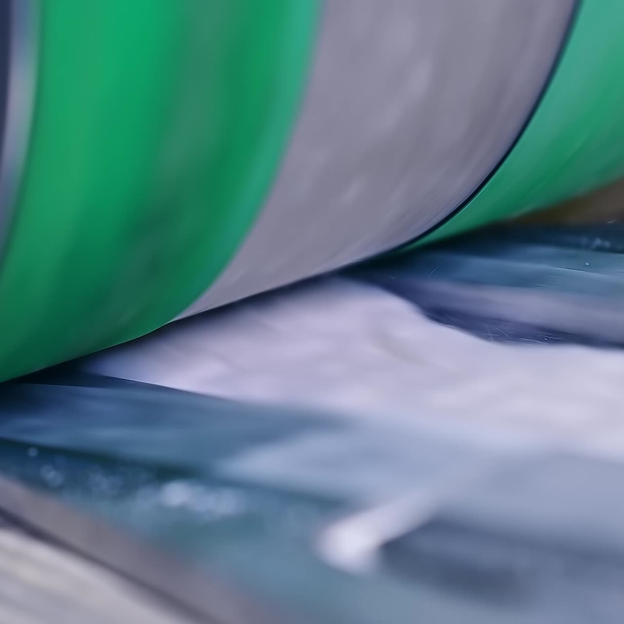Conveyor technology big rolls proccesing. Automated rolling sheets of cellulose for making diapers