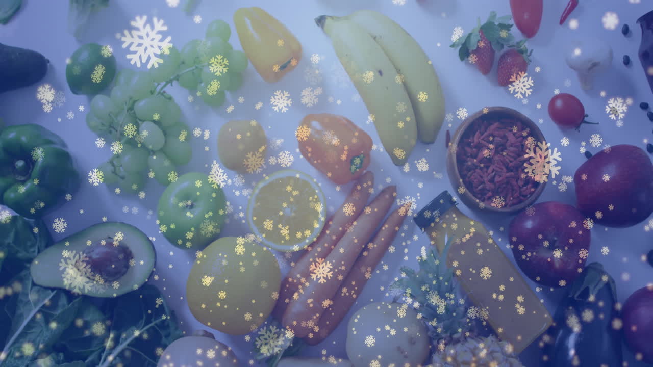 Fruits and vegetables with snowflake animation overlay creating festive atmosphere
