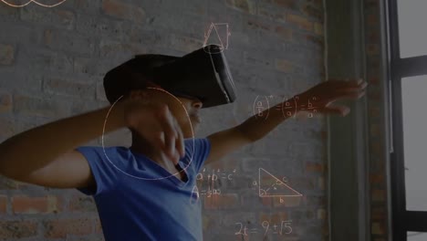 Boy-wearing-a-virtual-reality-headset-beside-a-window